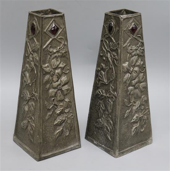 A pair of French Art Nouveau hammered pewter vases height 30cm